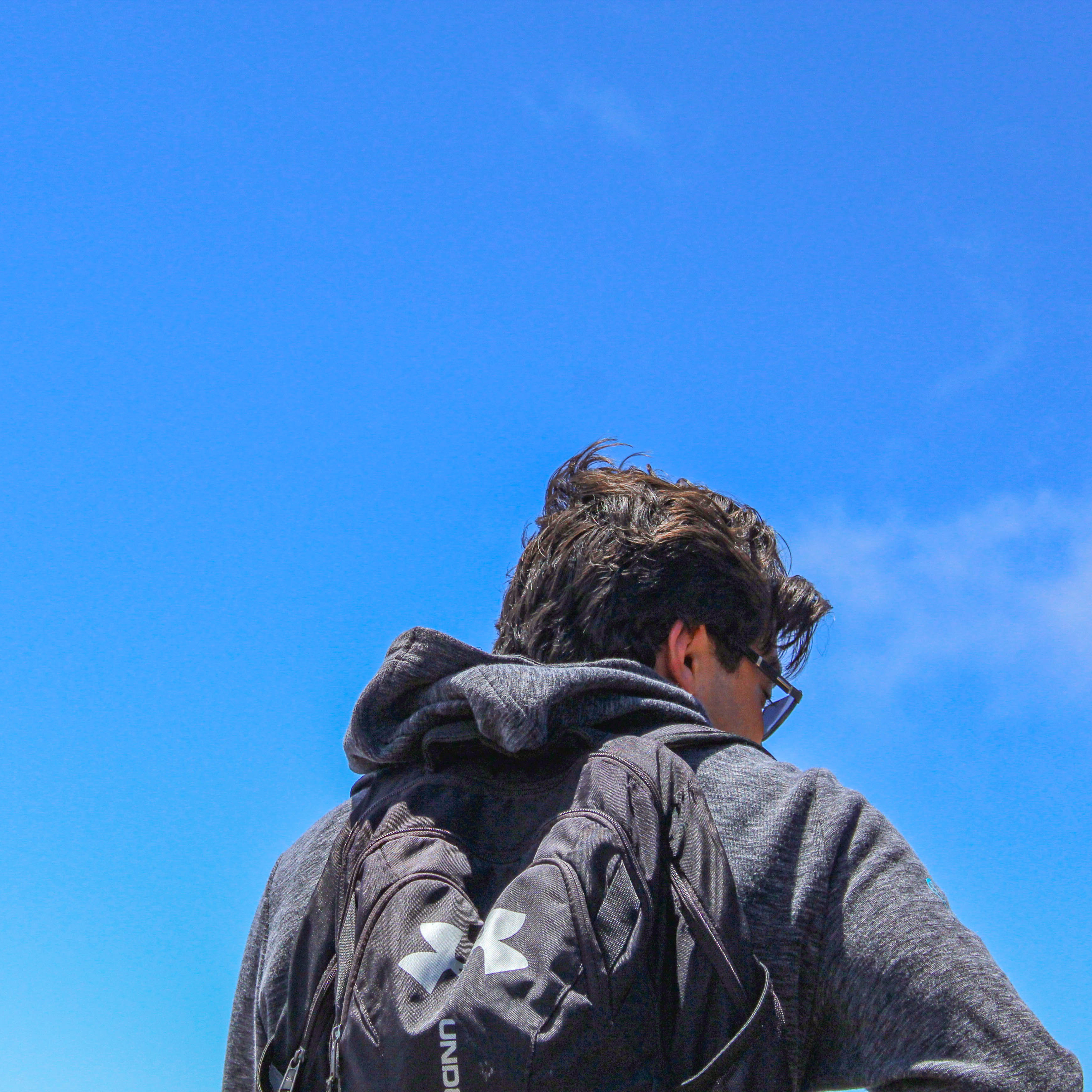 Image of a man wearing a backpack.