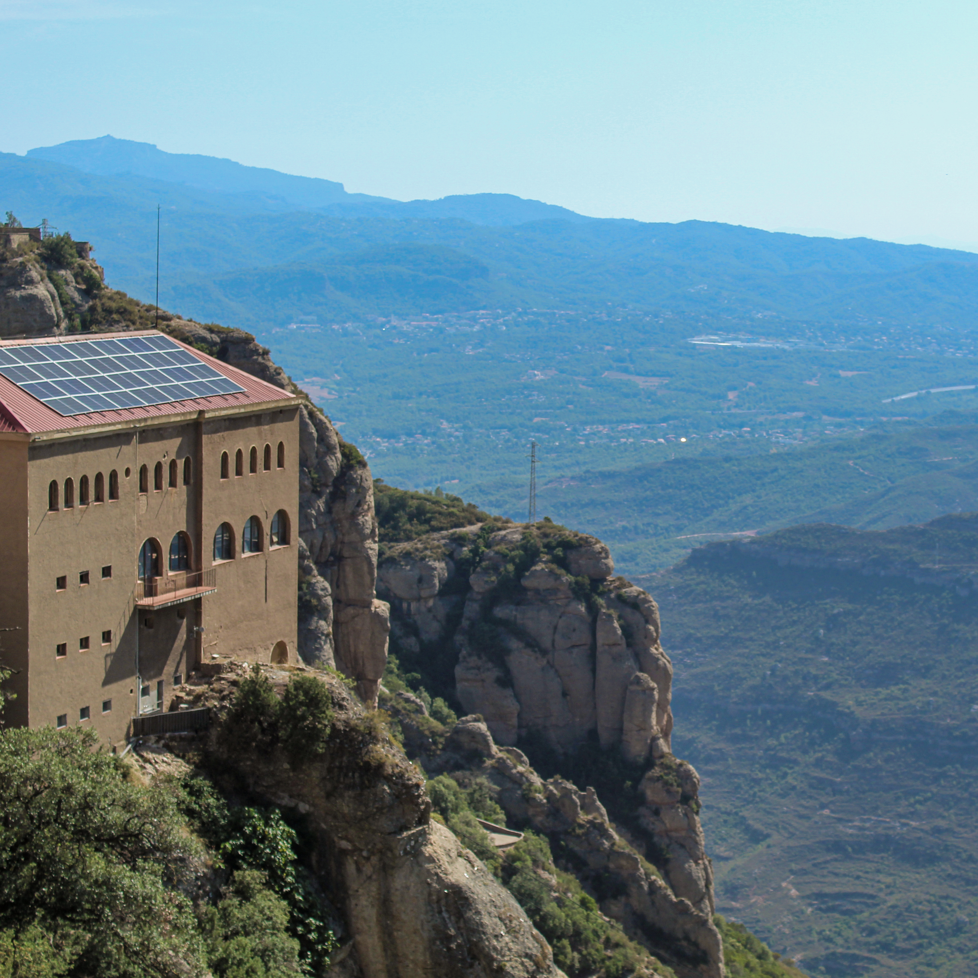 Image of a house on a cliff.
